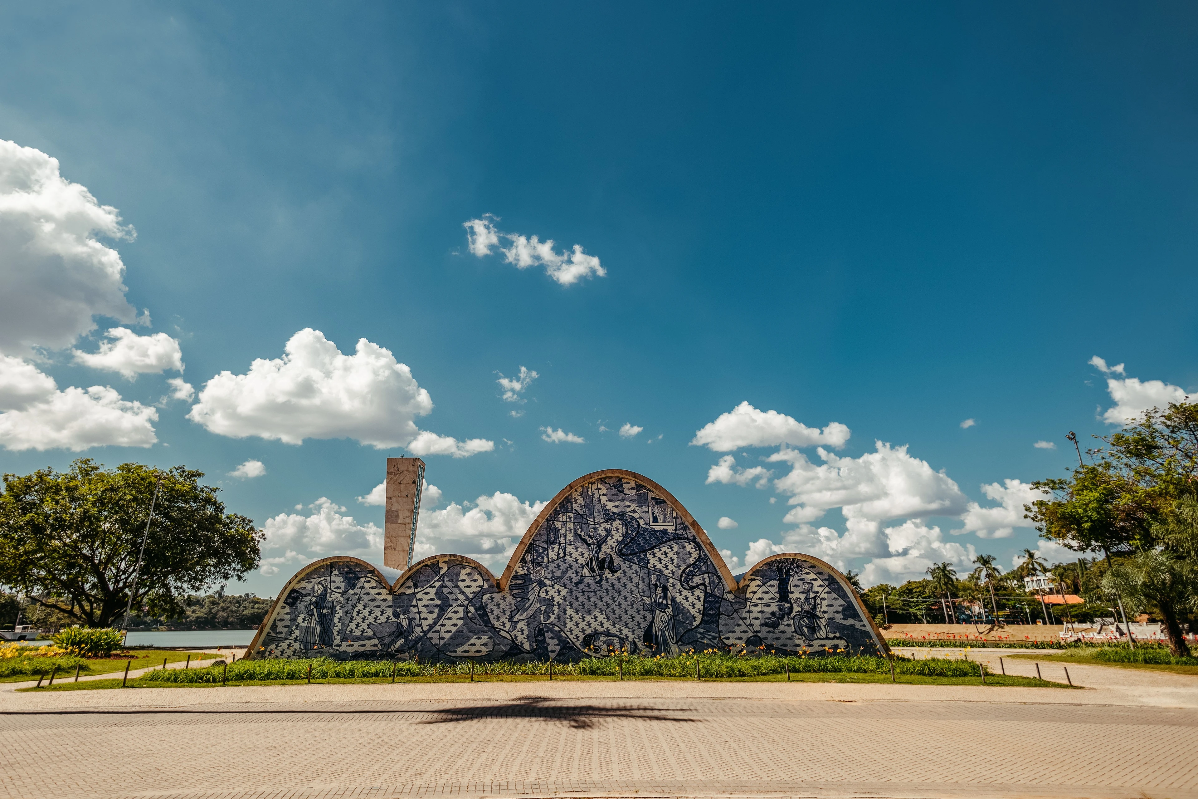 The tiled rear facade of Pampulha's church beneath a bright sky in Belo Horizonte