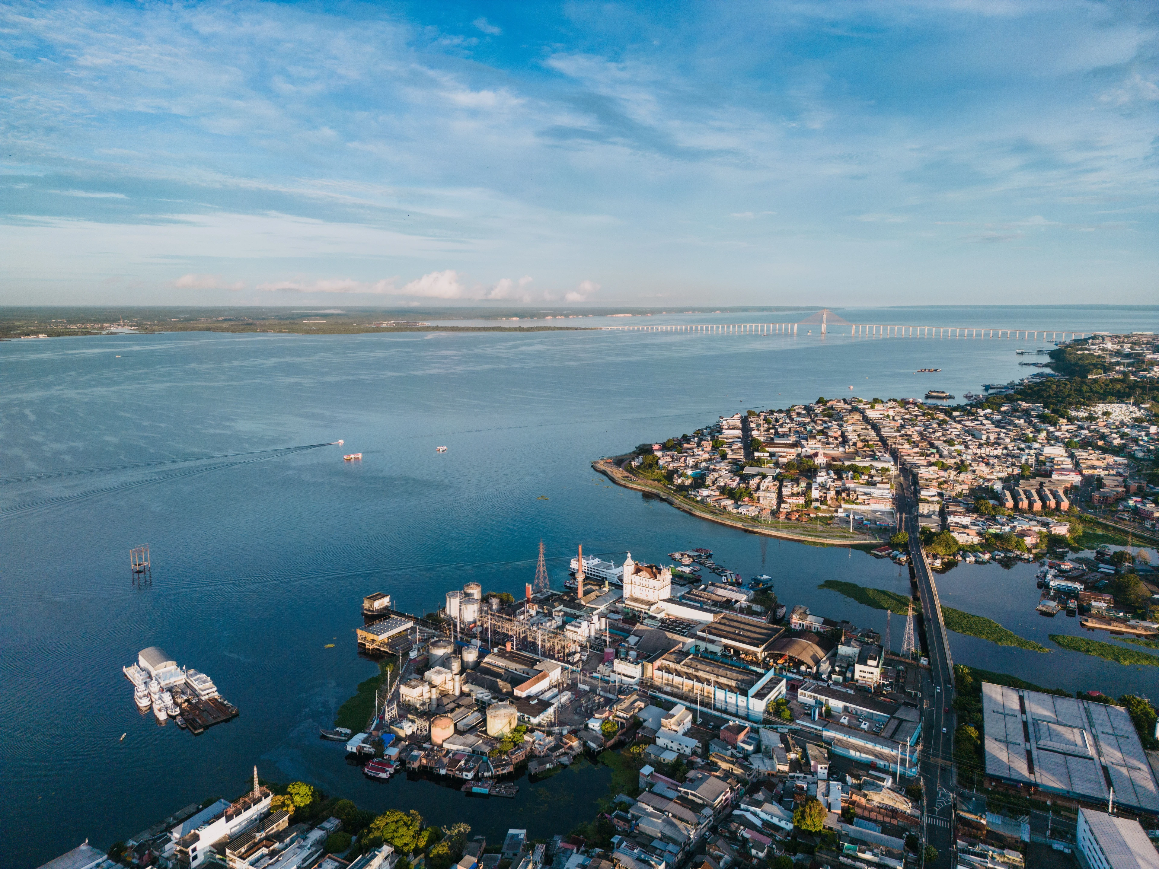 Manaus spreads along the Rio Negro with the river bridge extending toward the far bank