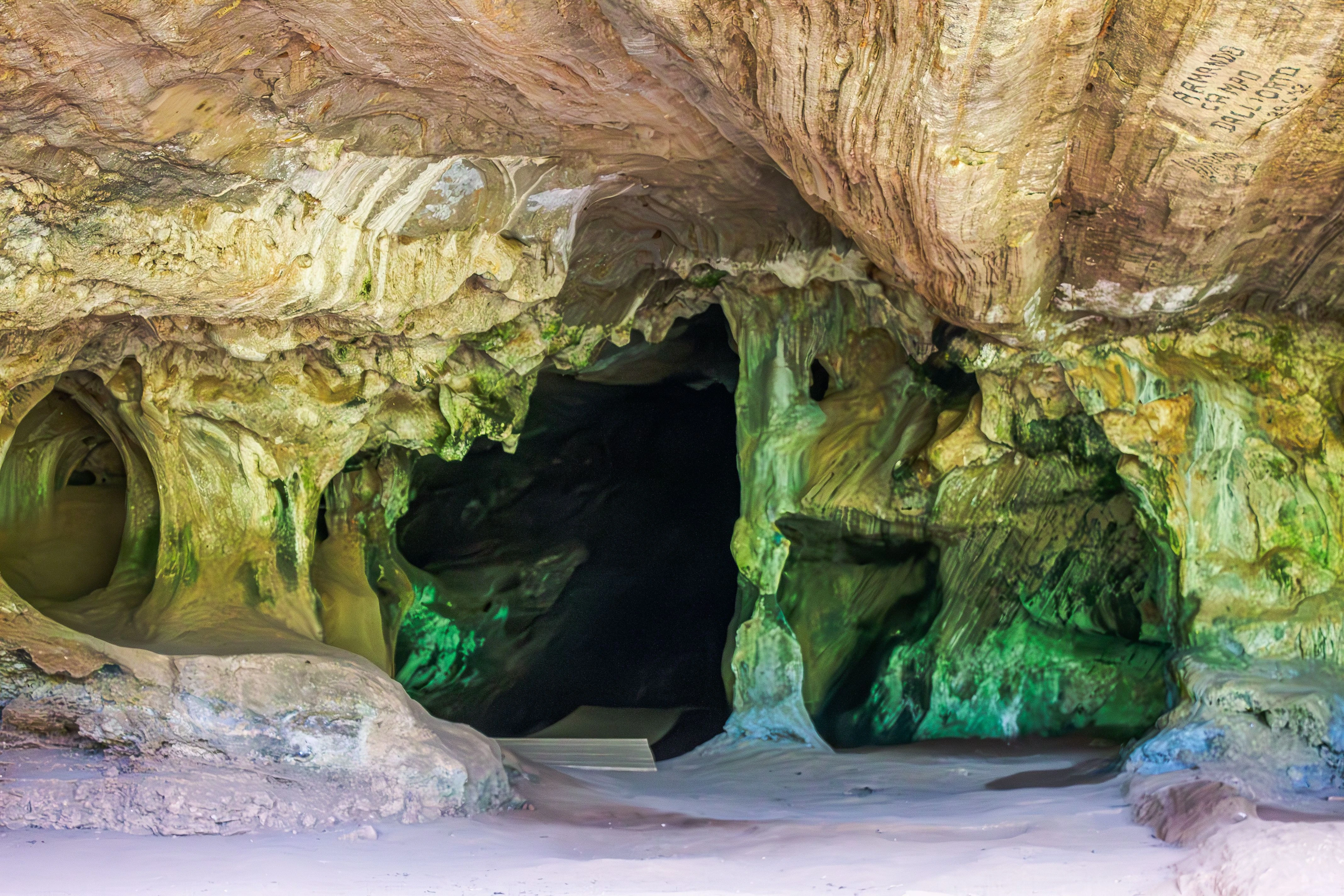 Sculpted rock at a cave mouth in Castelo, Espírito Santo, shown as Brazilian cave landscape context.