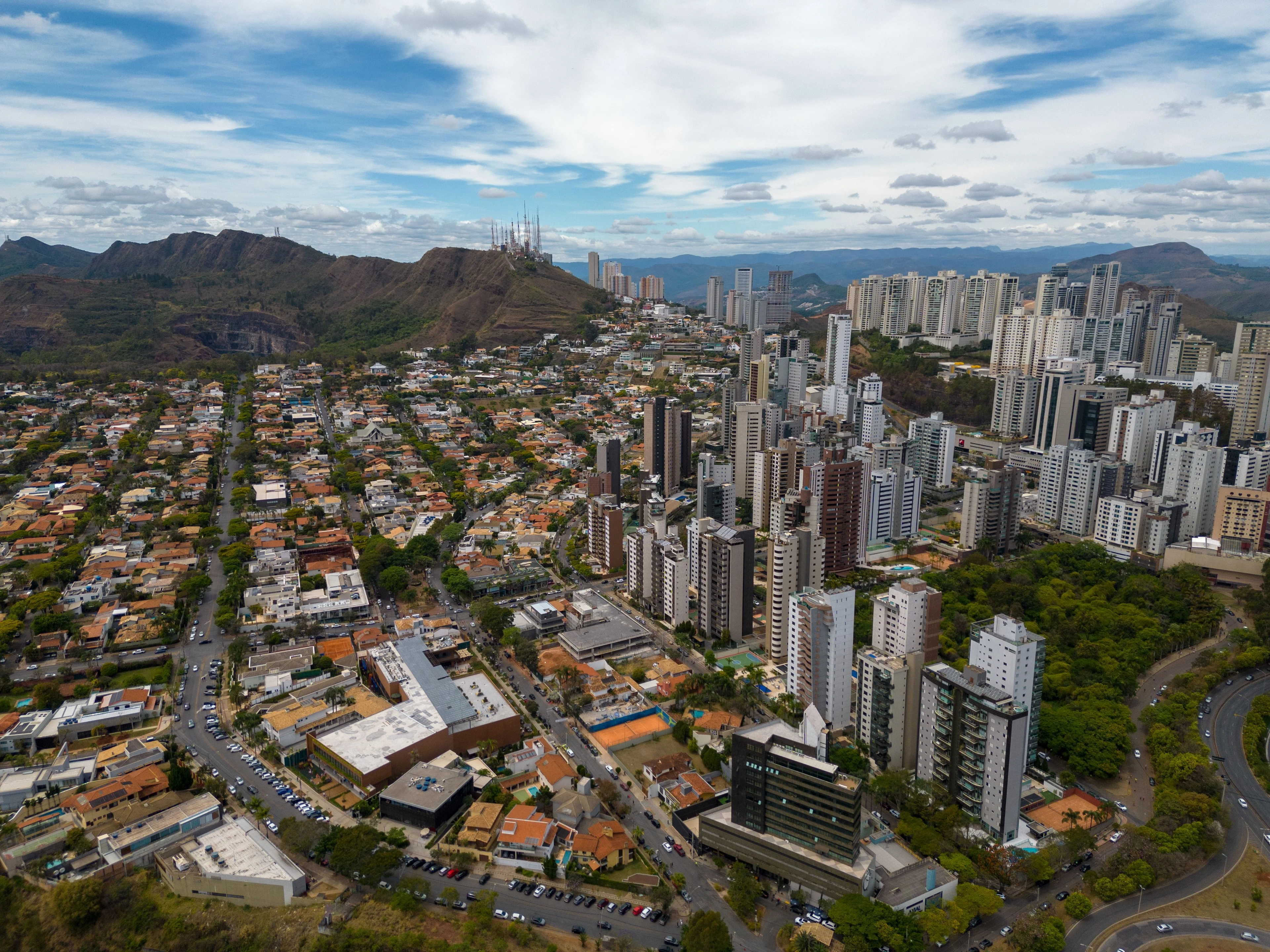 Belo Horizonte towers spread across the city toward a distant ridge