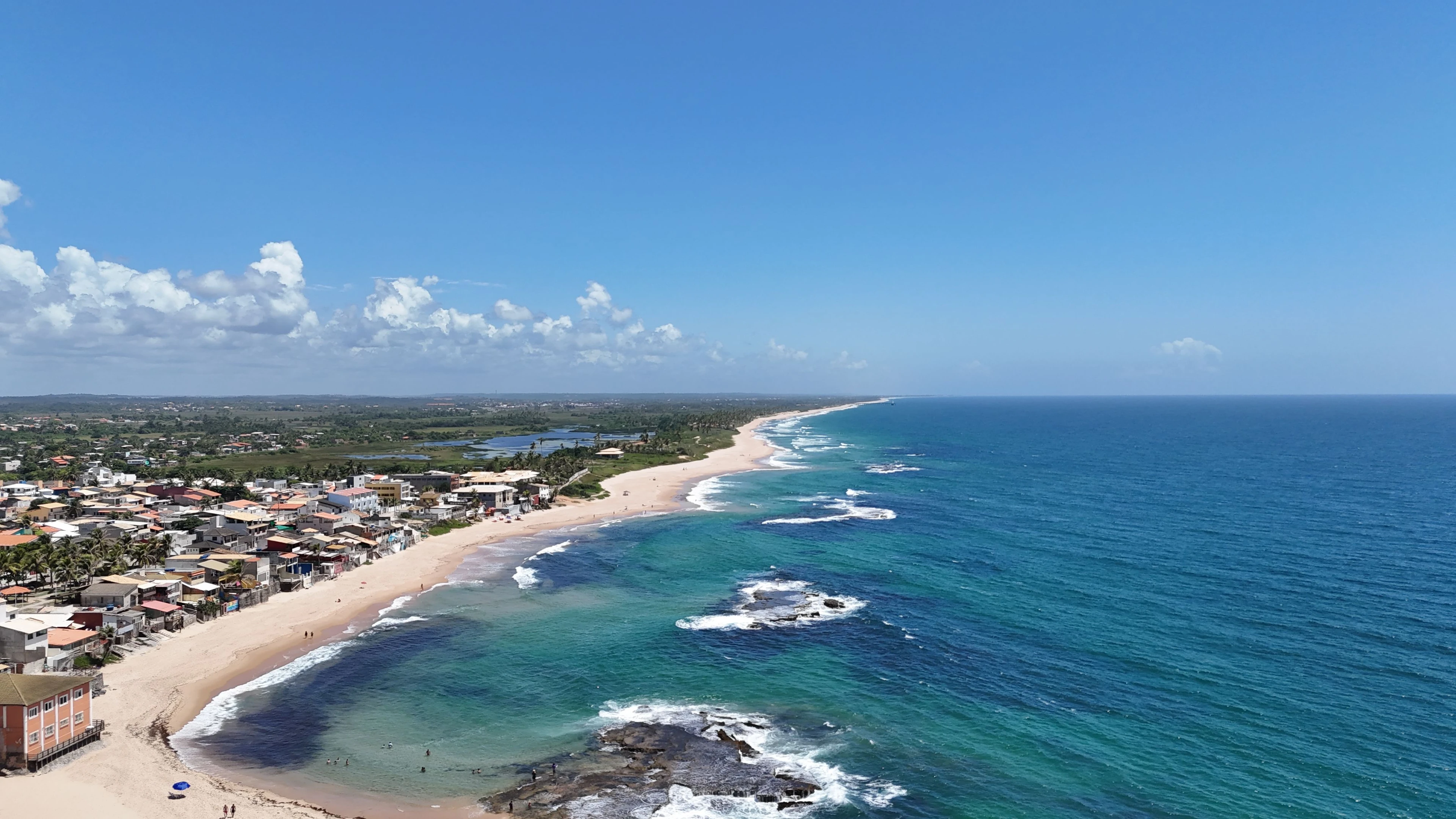 Breaking waves and blue water along Salvador’s coastline