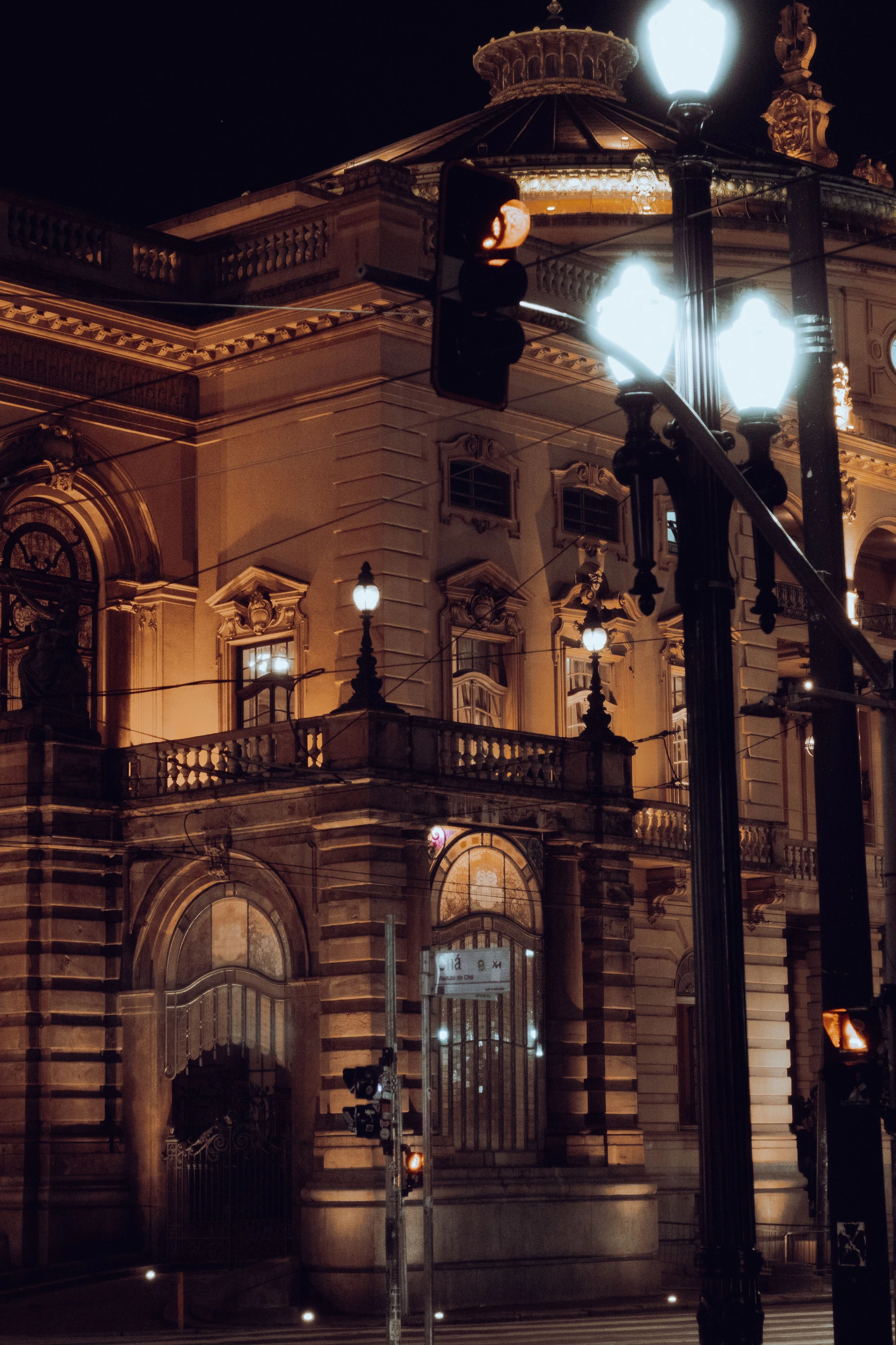 São Paulo's Theatro Municipal illuminated in warm light at night