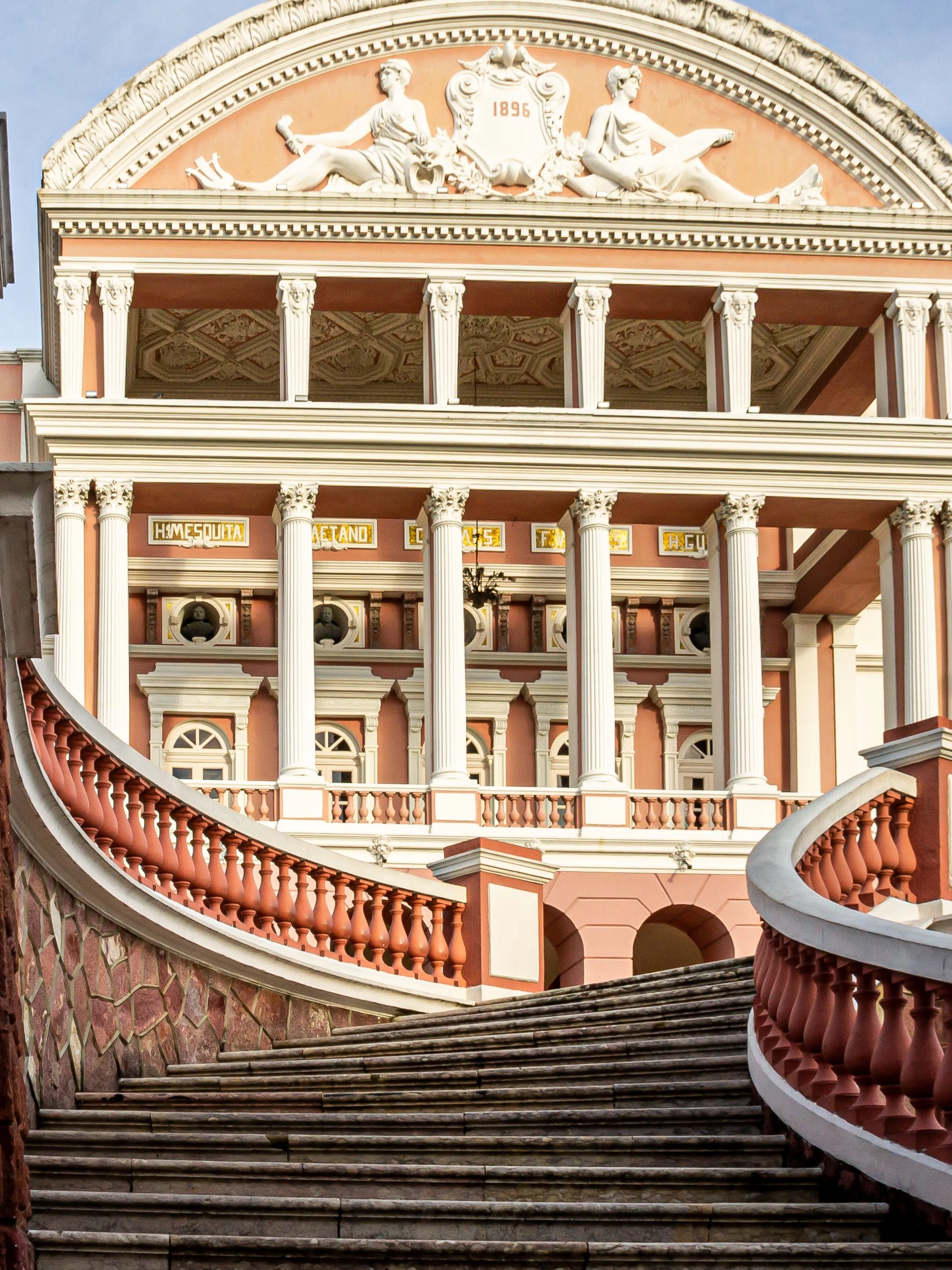 The grand staircase and richly decorated interior of Teatro Amazonas in Manaus.