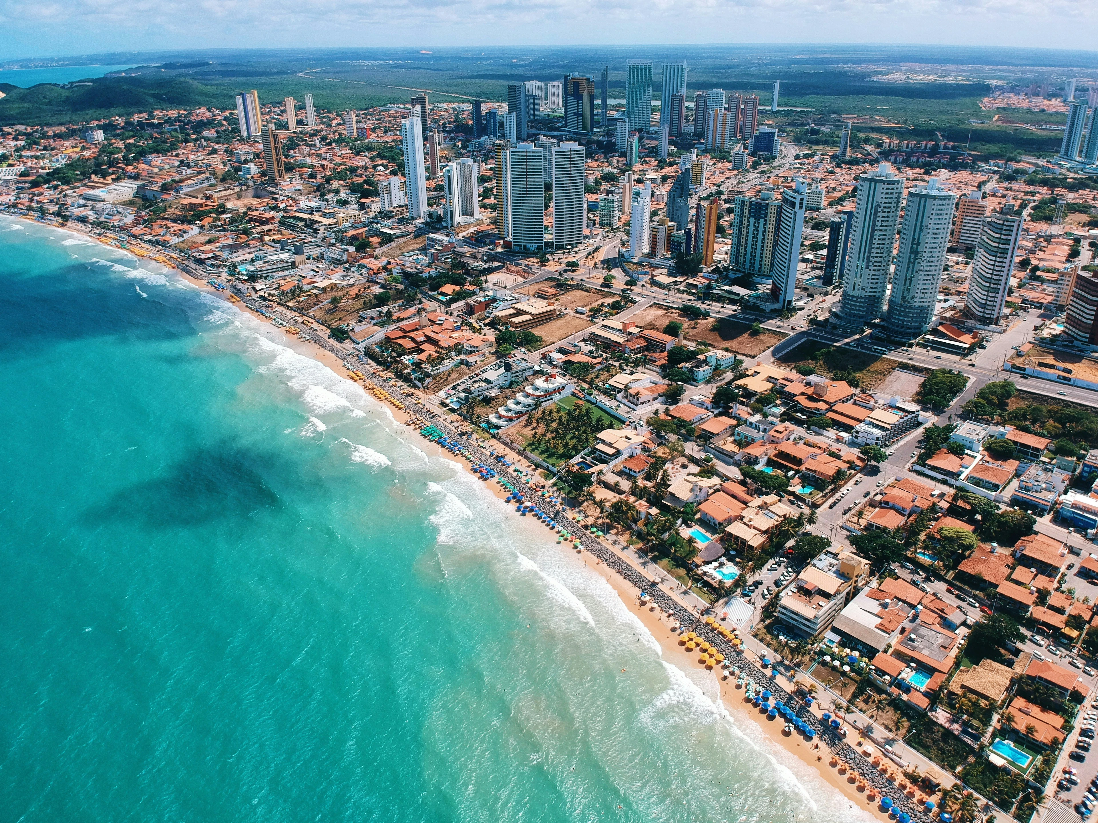 Natal’s Ponta Negra skyline and turquoise ocean seen from above