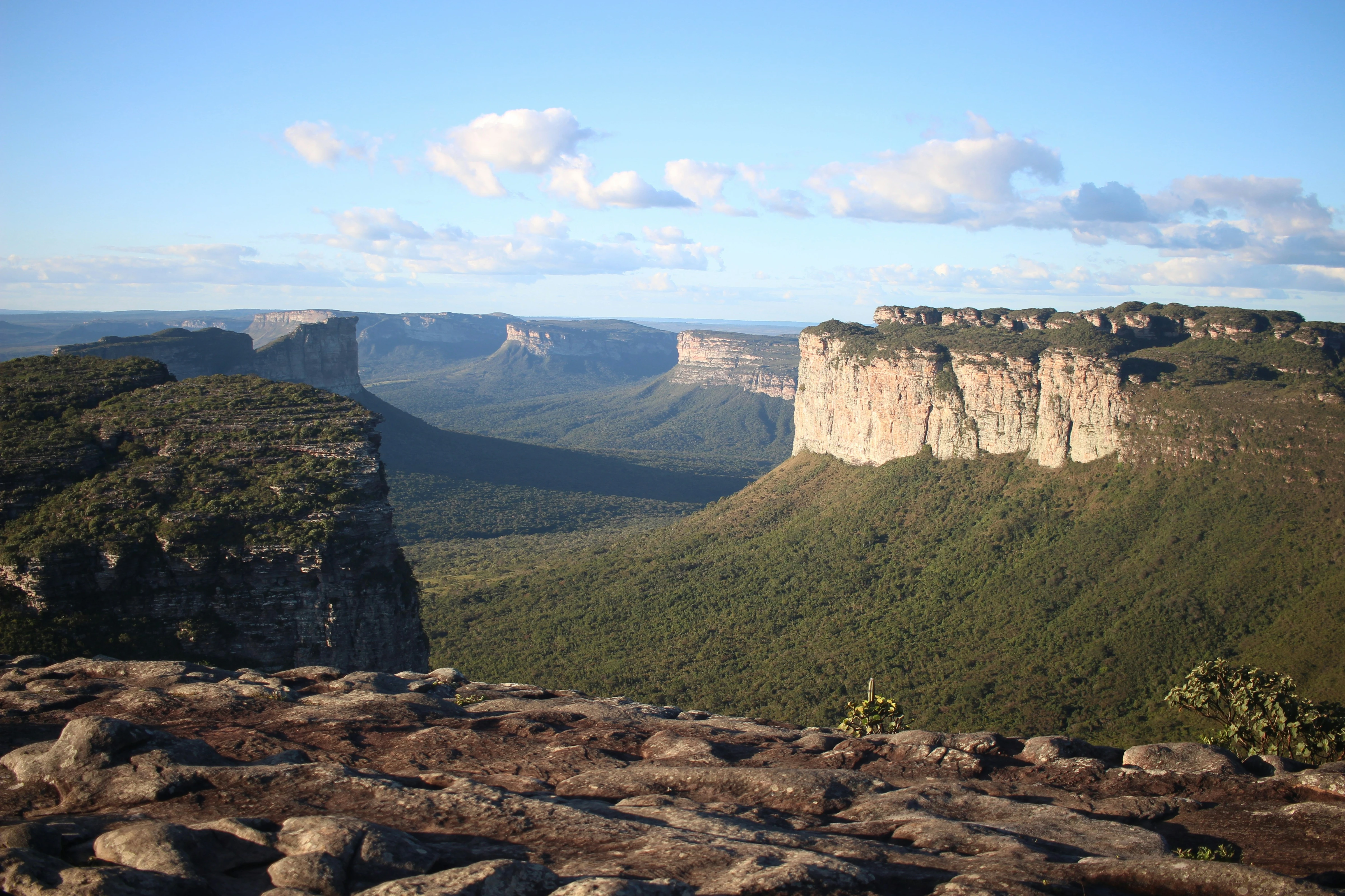 Sunlight crossing the layered mesas and valleys of Chapada Diamantina
